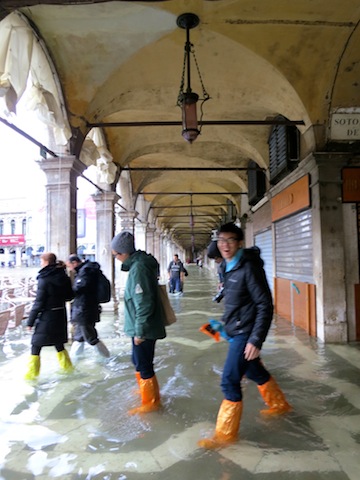 Tourists in flooded Venice