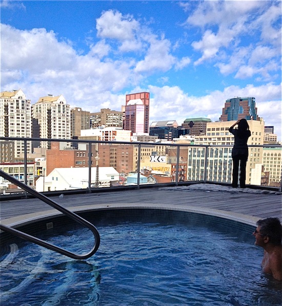 Outdoor whirlpool spa at Hotel Le Crystal Montreal