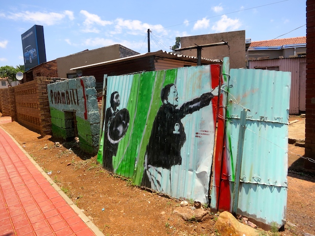 Mural on a tin fence in Soweto, South Africa