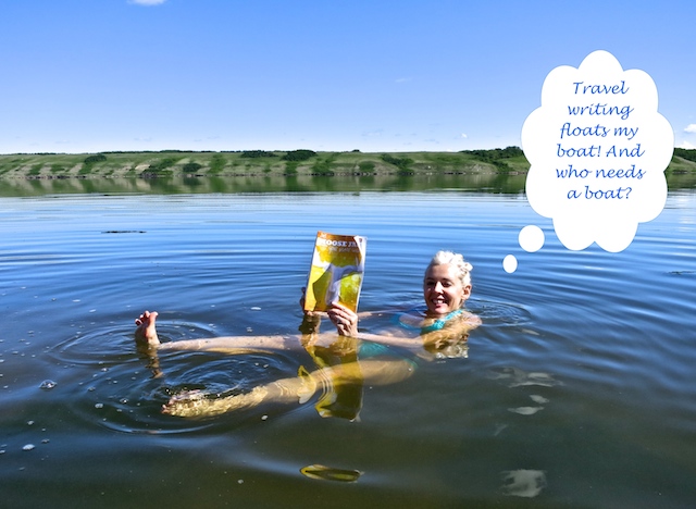 Woman floating in salt lake