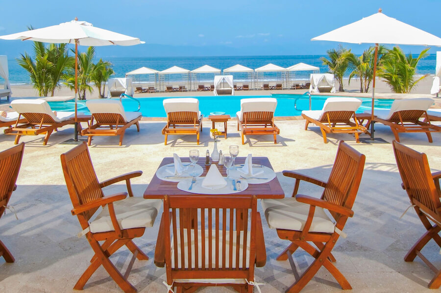 table by pool at the adults only mexico casa velas resort