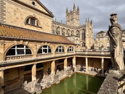 Roman baths with Bath Abbey behind.