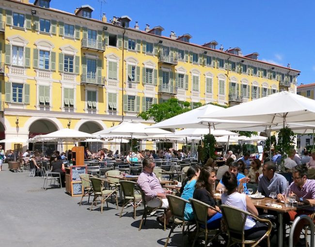 People eating an outdoor cafe