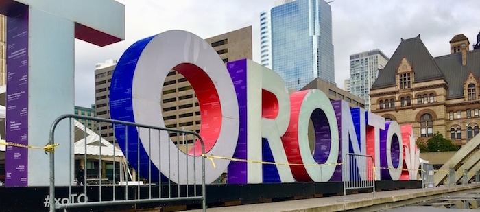 Big neon sign of Toronto in Nathan Phillips Square