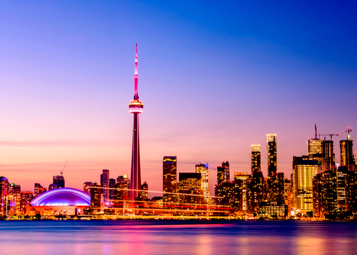 View of Toronto, Ontario, skyline at night.