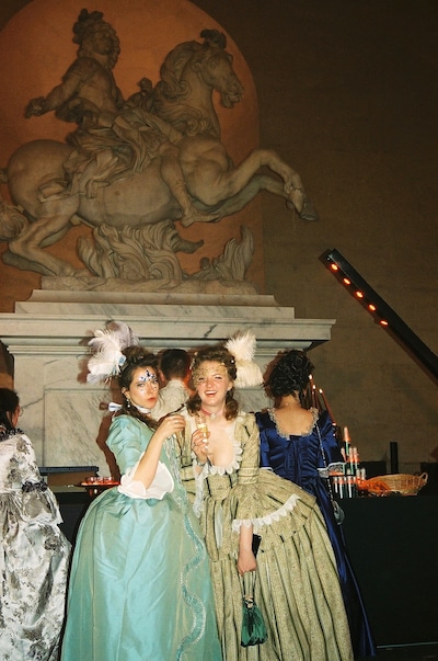 Two young women in costume at the Masked Ball in Versailles France