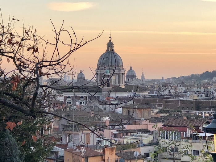 Rome at sunset with peach sky