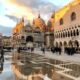 Beautiful sunset at St Mark's Square with wet ground
