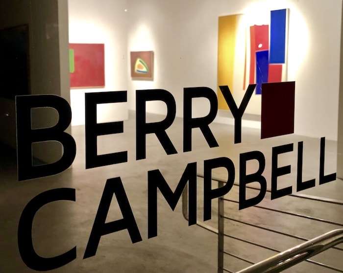 Berry Campbell Gallery sign in Chelsea New York with Perehudoff art exhibit in background