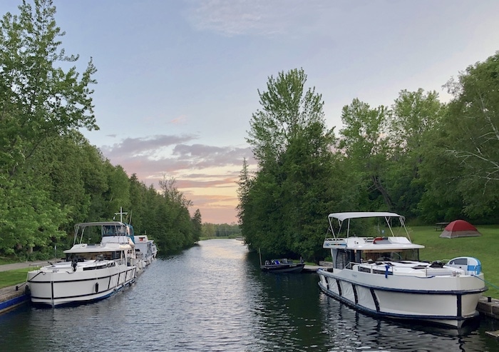 Our boat rental on the Rideau Canal at sunset