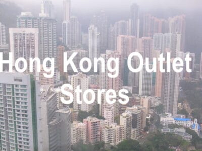 View of Hong Kong skyscrapers with text 'Hong Kong Outlet Stores'