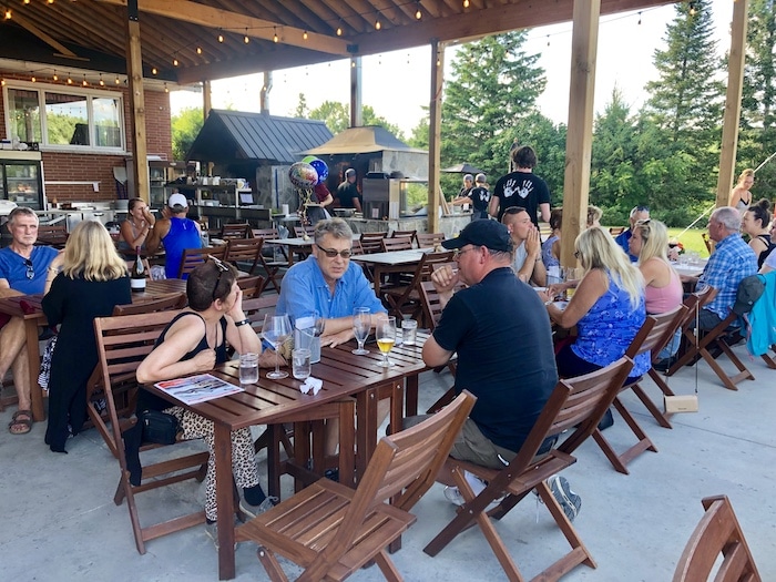 People eating at Scheuermann Vineyard and Winery