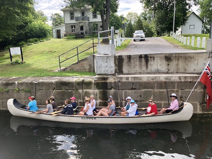 Voyageur canoe at Chaffey's Lock, Rideau Canal, Ontario