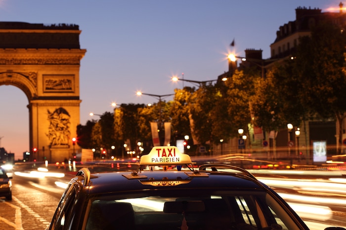 Paris taxi by the Arc de Triumph