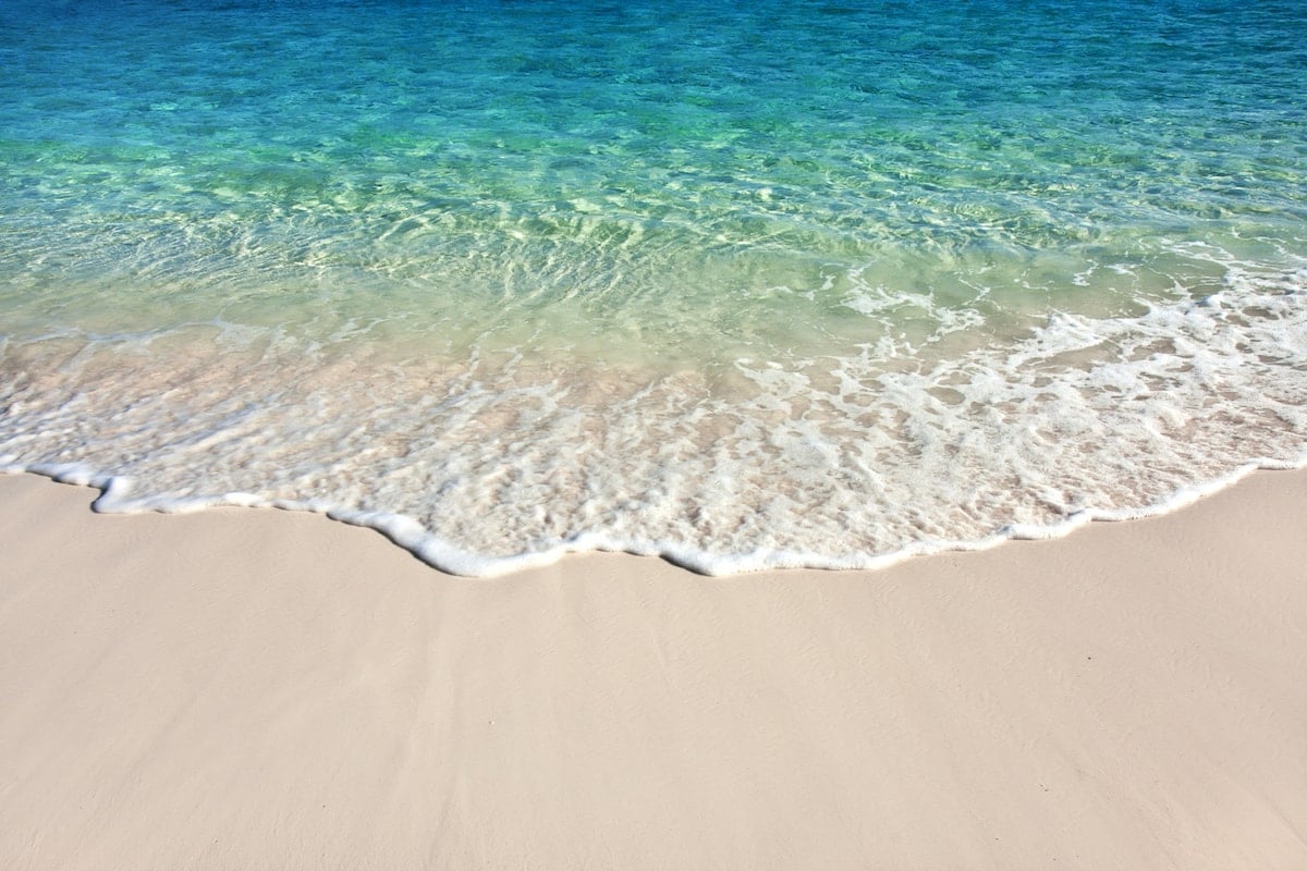 soft sand and waves that look like lace