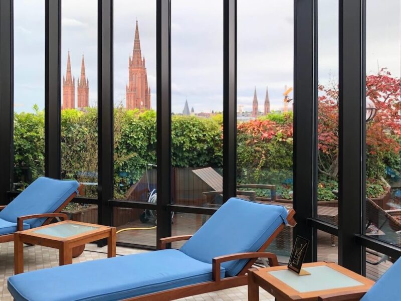 blue lounge chairs at wiebaden thermal pool