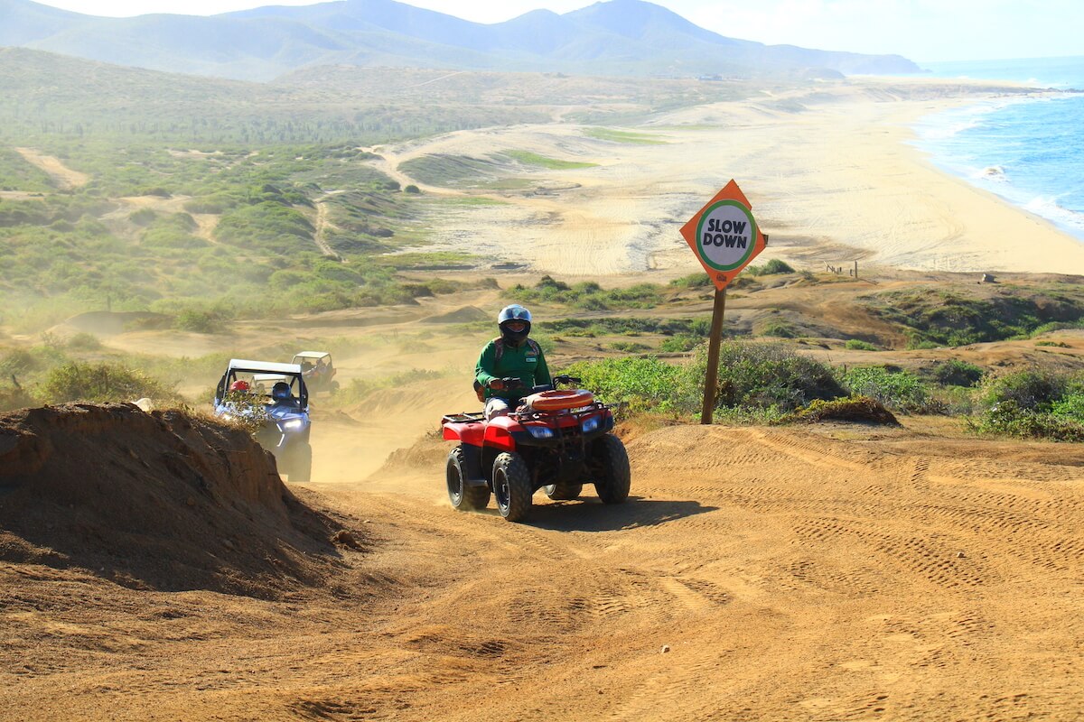 ATV tour Cabo San Lucas with panoramic sand dunes and ocean view