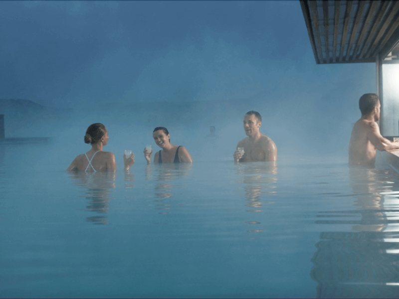 people enjoying themselves at the blue lagoon spa in iceland