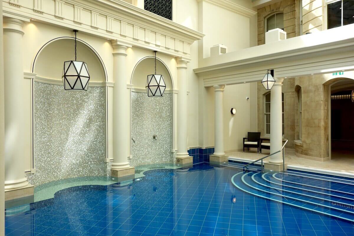thermal baths at gainsborough bath spa with large pool and pillars