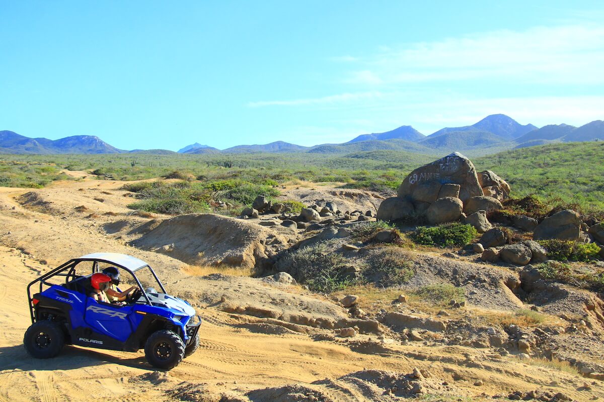 UTV on a sandy trail with the Baja California Desert and mountains