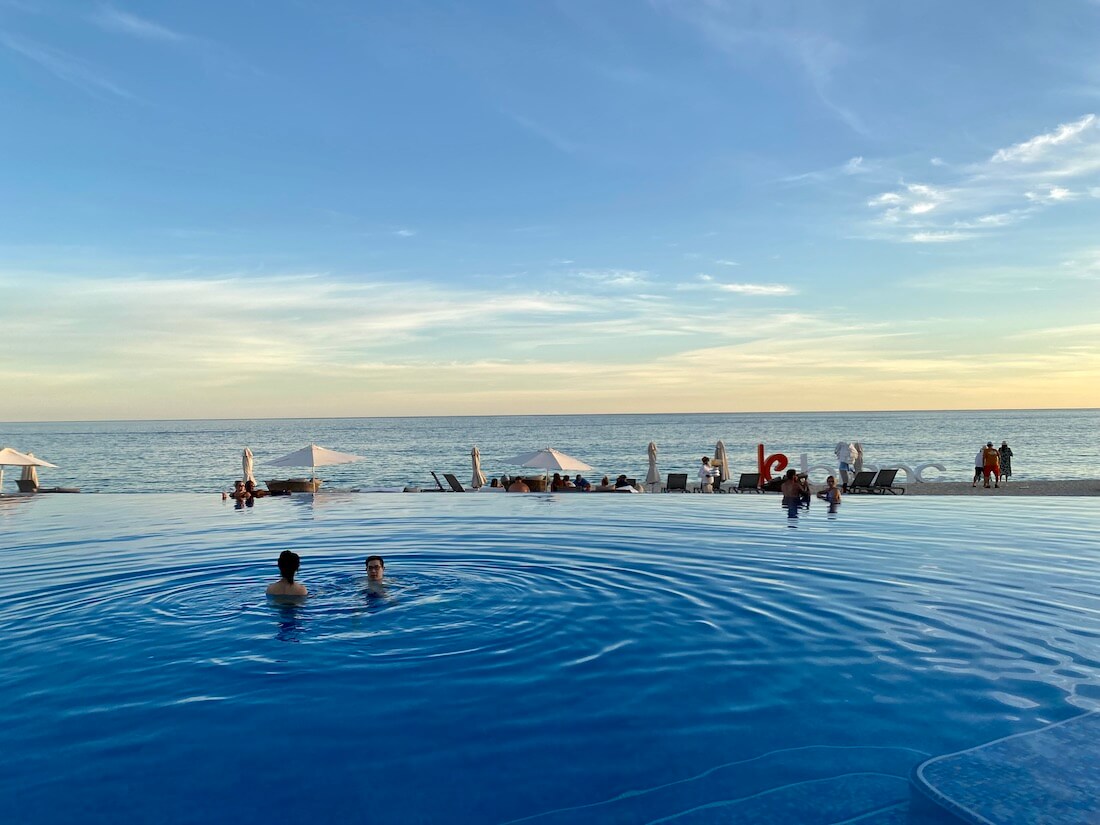 Infinity pool with ocean view beyond in Cabo