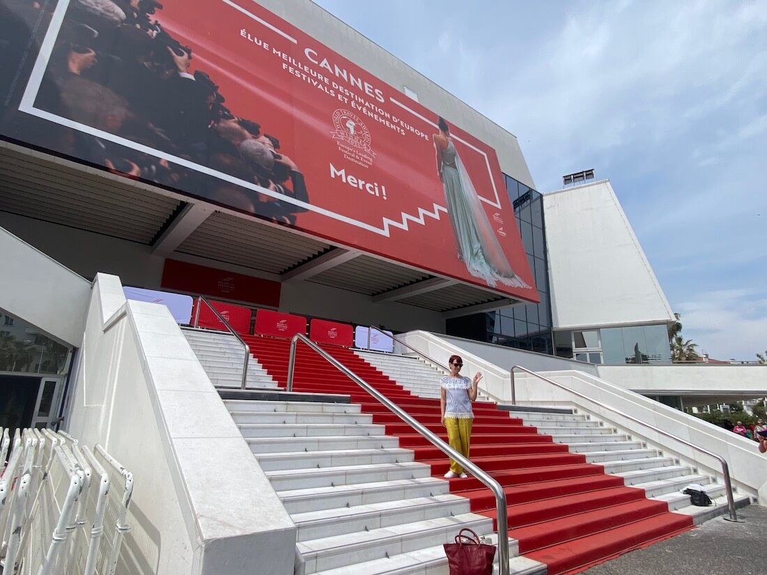 Woman posing on the red carpet, one of the most popular things to do in Cannes
