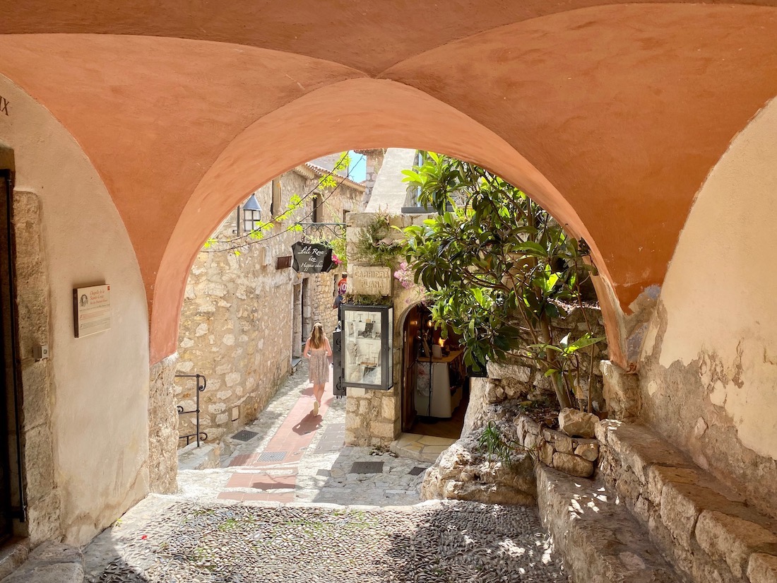Vaulted arch over a cobblestone street in Eze
