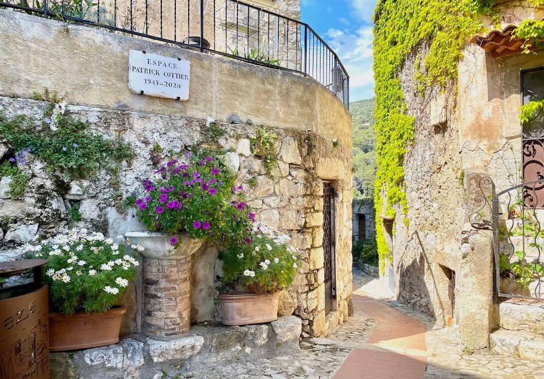 Stone walls and flower pots in the hilltop village of Eze on the French Riviera