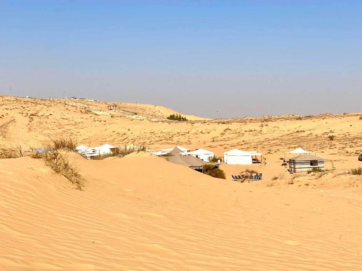 White tents in the sand dunes of the Negev Desert