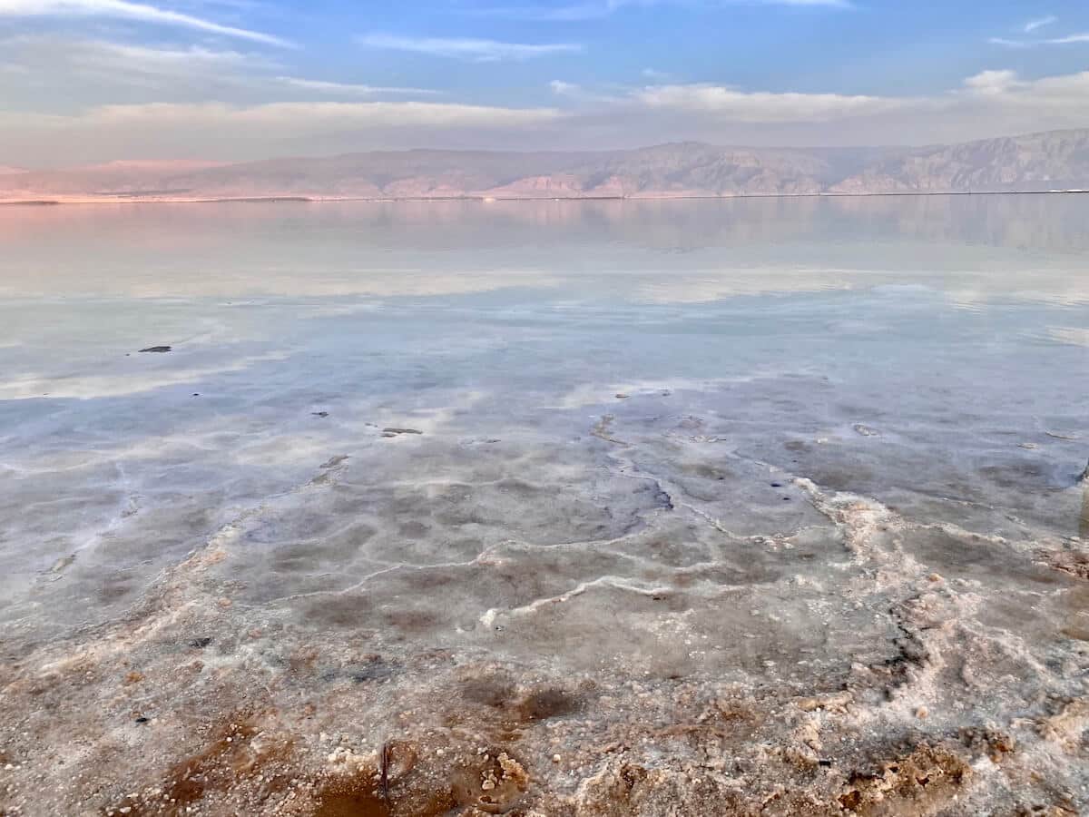 Pale water and salt crystals at the Dead Sea