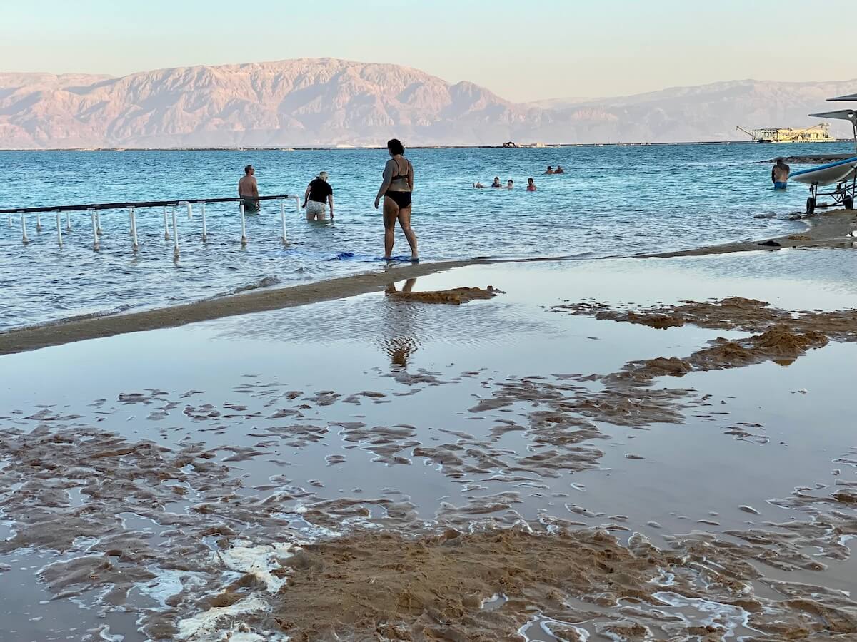 Dead Sea shore with puddles and salt 