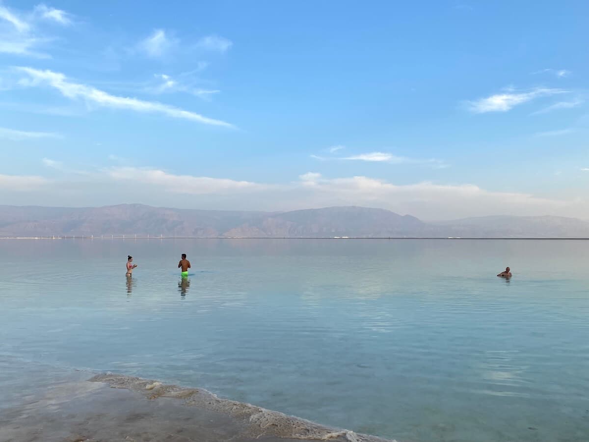 Three people in the Salt Lake in Israel