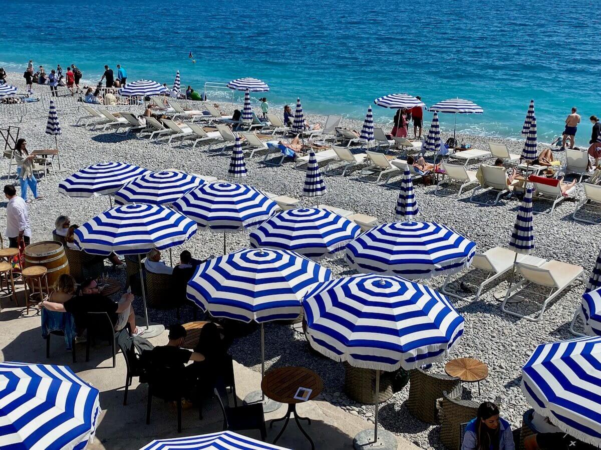Private beach club with fun umbrellas
