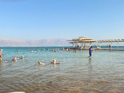 Woman floating in the Dead Sea in Neve Zohar, Israel