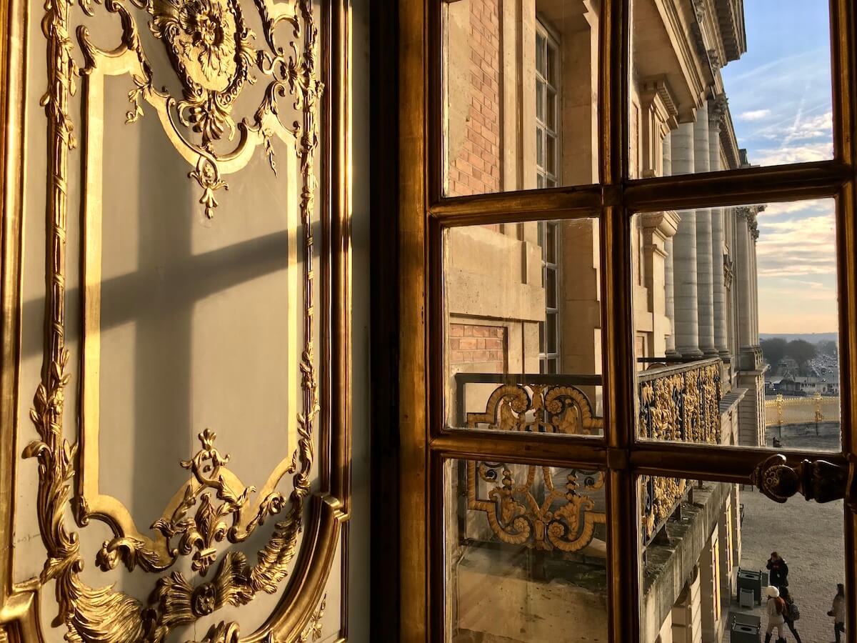 Sunlight through a window at Versailles Palace reflected on a wall