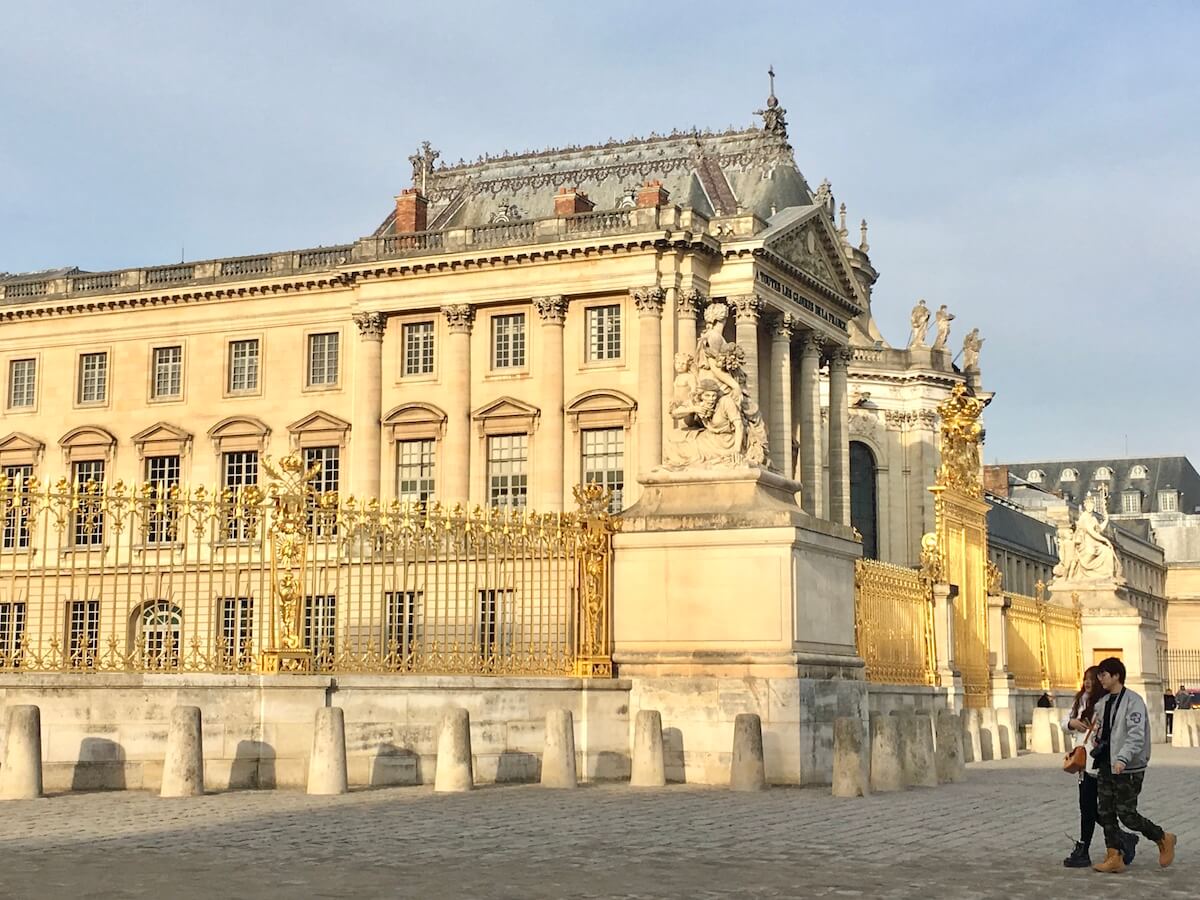 historic place of Versailles Palace in pale morning light.