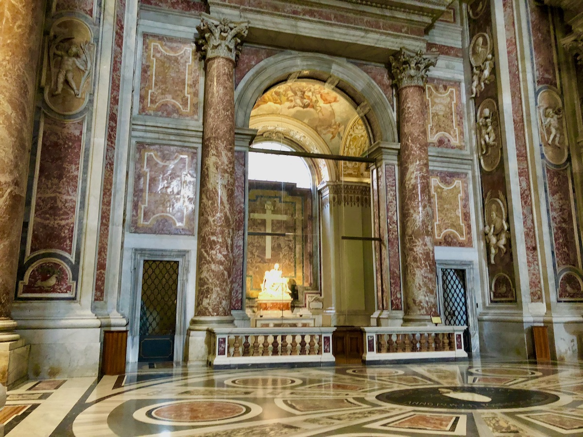Elaborate red marble interior at St. Peter's Basilica, one of the top historical places in the world