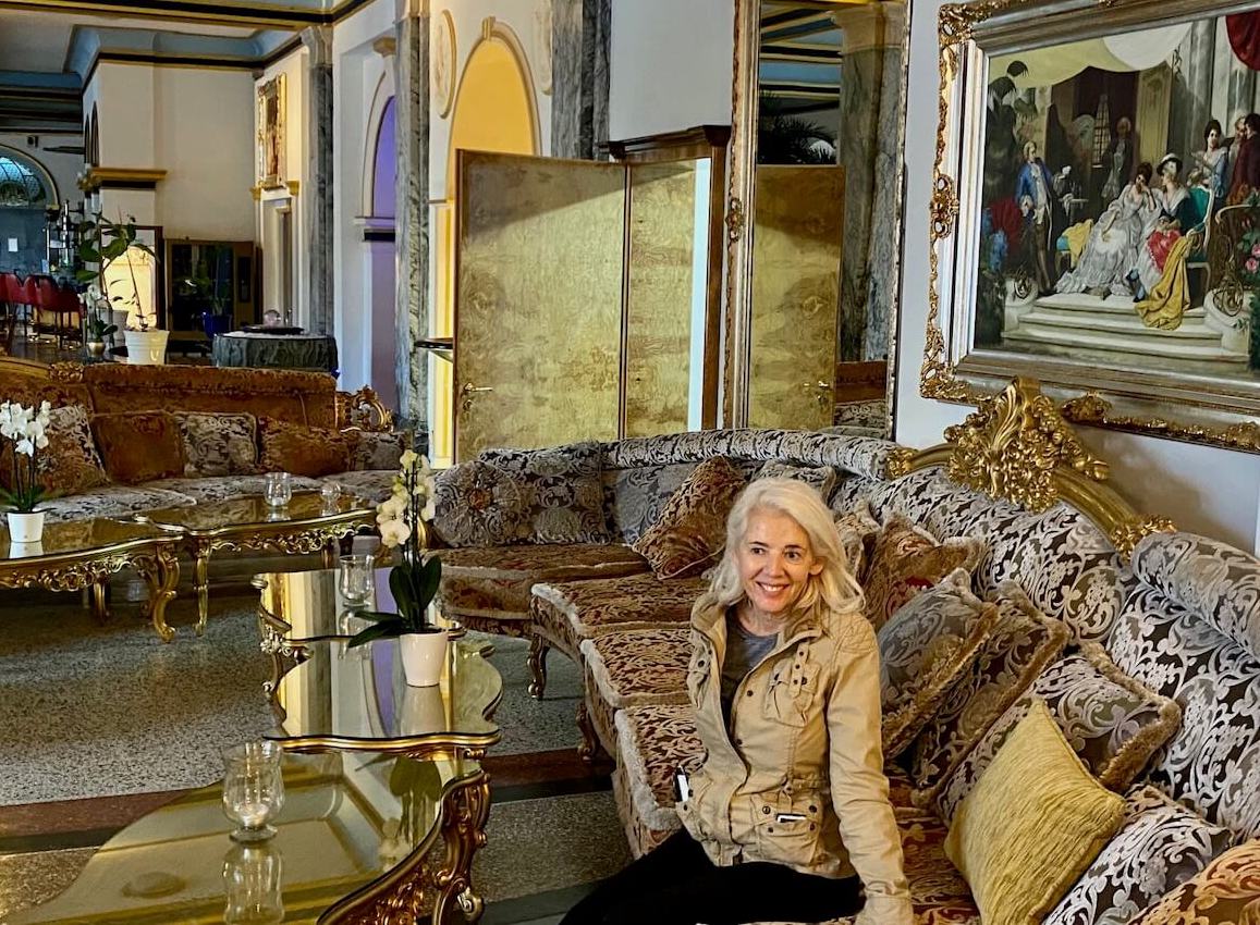 Carol Perehudoff in ornate lobby at Hackers Grand Hotel in the spa town of Bad Ems.